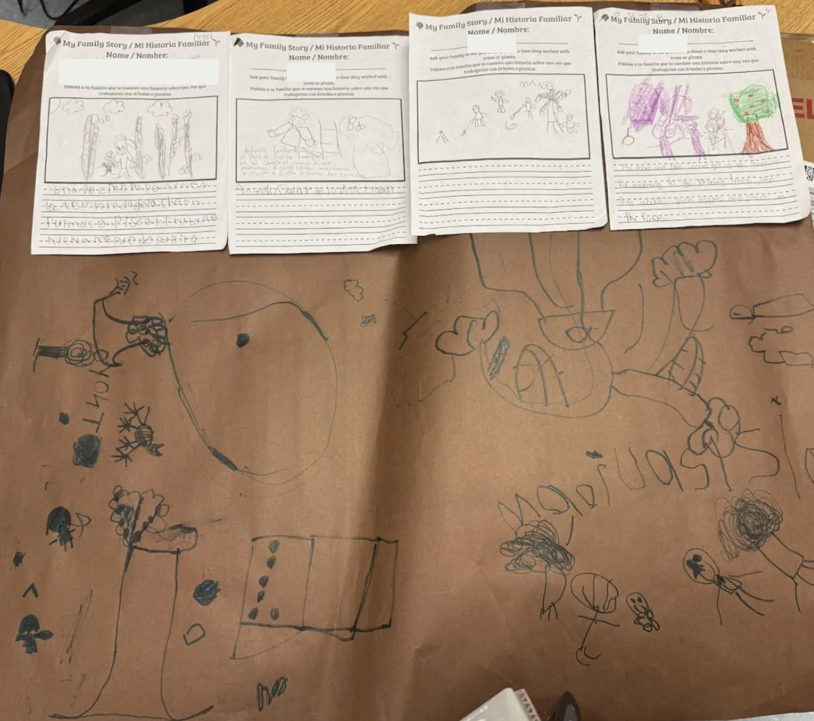 brown poster with family stories and students drawings